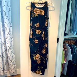 Form fitting floral dress.